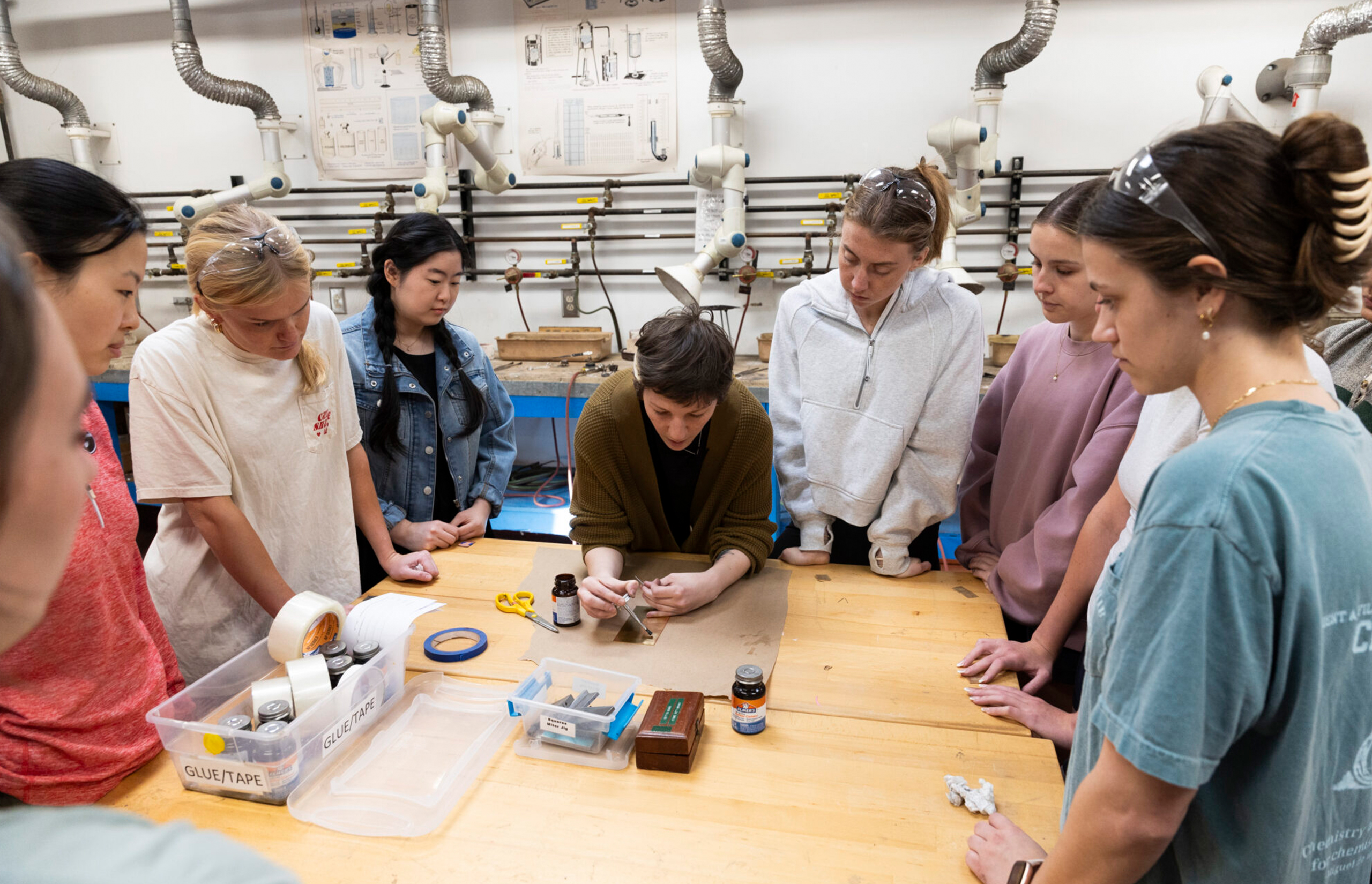 Group of students at table.